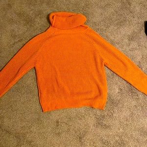 Orange turtle neck long sleeve sweater